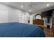 Spacious main bedroom featuring wood floors, natural light, ensuite bathroom, and walk-in closet at 1967 Cogar Dr, Decatur, GA 30032