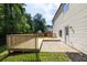 View of back of house featuring a wood deck, patio, and fenced yard at 2720 Meridian Ct, Dacula, GA 30019