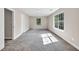 Bedroom with large windows, carpet, and neutral paint at 2720 Meridian Ct, Dacula, GA 30019