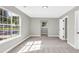 Bedroom featuring carpet, natural light and neutral paint at 2720 Meridian Ct, Dacula, GA 30019