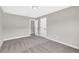 Bedroom featuring neutral paint, carpet, and trim at 2720 Meridian Ct, Dacula, GA 30019