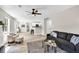 The living room features wood floors and an open layout that seamlessly connects to the kitchen at 2720 Meridian Ct, Dacula, GA 30019