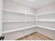 Walk-in pantry featuring ample shelving and storage space at 2720 Meridian Ct, Dacula, GA 30019