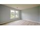 Serene bedroom offering natural light, neutral carpet, and a peaceful ambiance at 2794 Craig Ct, Marietta, GA 30062