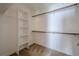 Bright walk-in closet featuring built-in shelving and dual rods for ample storage space at 2794 Craig Ct, Marietta, GA 30062