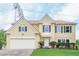 Charming two-story home featuring a two-car garage and well-manicured front lawn with sunny exposure at 2794 Craig Ct, Marietta, GA 30062