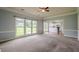Open-concept living area with large windows and seamless flow into the adjacent kitchen at 2794 Craig Ct, Marietta, GA 30062
