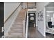 Inviting entryway with hardwood floors, staircase, and elegant decor at 3586 Maple Hill Rd, Stonecrest, GA 30038
