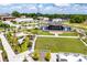 Aerial view showcasing the Deutsche Amphitheater and its surrounding green spaces with mature trees, lawns, and landscaping at 6391 Katherine St, Douglasville, GA 30134
