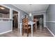 Dining room featuring a white table, seating for four, and an open layout at 6391 Katherine St, Douglasville, GA 30134