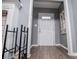 Inviting entryway with a white front door and wood-look flooring at 6391 Katherine St, Douglasville, GA 30134