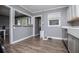 Well-lit kitchen featuring white cabinetry and stainless steel appliances at 6391 Katherine St, Douglasville, GA 30134