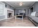 Cozy living room with a brick fireplace and neutral decor at 6391 Katherine St, Douglasville, GA 30134