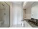 Bathroom with a glass shower, tile floors, granite vanity top, and white cabinets at 2255 Peachtree Ne Rd # 620, Atlanta, GA 30309