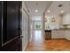 Inviting entryway with light hardwood floors leads to a modern kitchen and bright, open living space at 2255 Peachtree Ne Rd # 620, Atlanta, GA 30309