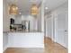 Well-lit kitchen with stainless steel appliances, granite counters, and stylish pendant lighting at 2255 Peachtree Ne Rd # 620, Atlanta, GA 30309