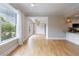 Bright living room with hardwood floors, large windows and adjacent eat-in kitchen at 2255 Peachtree Ne Rd # 620, Atlanta, GA 30309