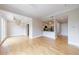 Open living room area with hardwood floors, stylish lighting, and neutral paint at 2255 Peachtree Ne Rd # 620, Atlanta, GA 30309