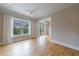 Spacious living room with hardwood floors, large windows, and access to a private balcony at 2255 Peachtree Ne Rd # 620, Atlanta, GA 30309