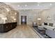 Building lobby features a brick accent wall, comfortable seating, and an elevator at 2255 Peachtree Ne Rd # 620, Atlanta, GA 30309