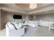 Community lounge with plush seating, a TV, and built-in cabinetry at 2255 Peachtree Ne Rd # 620, Atlanta, GA 30309