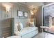 Comfortable lounge seating area with elegant wall art and modern lighting at 2255 Peachtree Ne Rd # 620, Atlanta, GA 30309