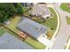 A backyard is seen with a shed and boat near the fence at 3026 Towne Mill Ave, Canton, GA 30114
