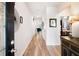 Bright entryway with wood floors, white walls, and views into the home's living spaces at 3026 Towne Mill Ave, Canton, GA 30114