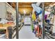 Unfinished basement features wood ceilings, white walls, and is ready for customized renovation at 407 Amber Ln, Woodstock, GA 30189