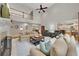 Open living room with fireplace and built-ins, high ceilings and views to kitchen and dining area at 407 Amber Ln, Woodstock, GA 30189