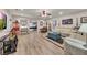 Spacious living room with hardwood floors, recessed lighting, and comfortable seating arrangements at 407 Amber Ln, Woodstock, GA 30189
