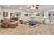 Inviting living room with a cozy armchair and a sectional couch, perfect for entertaining guests at 407 Amber Ln, Woodstock, GA 30189