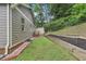 Home exterior showing a tidy backyard with garden beds at 532 Lemon Ne St, Marietta, GA 30060