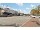 Street view showcasing vintage storefronts with apartments above, street parking, brick sidewalks, and crosswalks at 532 Lemon Ne St, Marietta, GA 30060