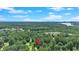 Scenic aerial view of the neighborhood nestled within a lush forest landscape, showcasing the community's location at 6918 Heritage Pl, Acworth, GA 30102