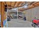 Unfinished basement providing storage, including shelves and tubs at 6918 Heritage Pl, Acworth, GA 30102