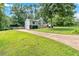 Beautiful home with lush lawn and an inviting driveway for easy access at 6918 Heritage Pl, Acworth, GA 30102