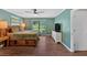 Relaxing main bedroom boasts calming colors, abundant natural light, and a decorative bedframe at 6918 Heritage Pl, Acworth, GA 30102