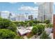 View from a downtown building with surrounding green space and city views at 77 Peachtree Ne Pl # 101, Atlanta, GA 30309
