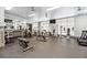 Spacious gym featuring modern exercise equipment and large windows for plenty of natural light at 77 Peachtree Ne Pl # 101, Atlanta, GA 30309