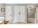 Kitchen area with stainless steel fridge and plenty of storage space at 100 Spring Ridge Ct, Roswell, GA 30076