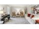 Cozy formal living room with a piano, comfortable seating, and elegant decor at 100 Spring Ridge Ct, Roswell, GA 30076