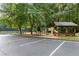 Outdoor playground with picnic tables and a covered bench, ideal for Gathering fun and community gatherings at 100 Spring Ridge Ct, Roswell, GA 30076