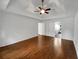 Bedroom features hardwood floors, two closets, an ensuite and ceiling fan at 110 Wyngate Way, Fayetteville, GA 30215