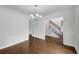 Spacious dining room with hardwood floors, crown molding, and chandelier at 110 Wyngate Way, Fayetteville, GA 30215