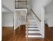 Grand foyer with hardwood floors, staircase, and open layout at 110 Wyngate Way, Fayetteville, GA 30215