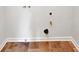 Neat laundry room featuring tile floor and utility connections ready for washer and dryer at 110 Wyngate Way, Fayetteville, GA 30215