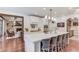 Bright kitchen features a large island with seating and stainless steel appliances at 120 Slate Dr, Buford, GA 30518