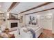 Inviting living room boasts a fireplace, built-in shelves, and access to the staircase at 120 Slate Dr, Buford, GA 30518
