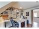 Well-lit home office with custom built-ins, providing ample storage and workspace at 120 Slate Dr, Buford, GA 30518